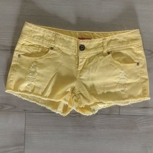 NWOT yellow distressed jean shorts size 5